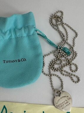 Tiffany & Co. Blue Pouch with Silver Heart Tag Necklace